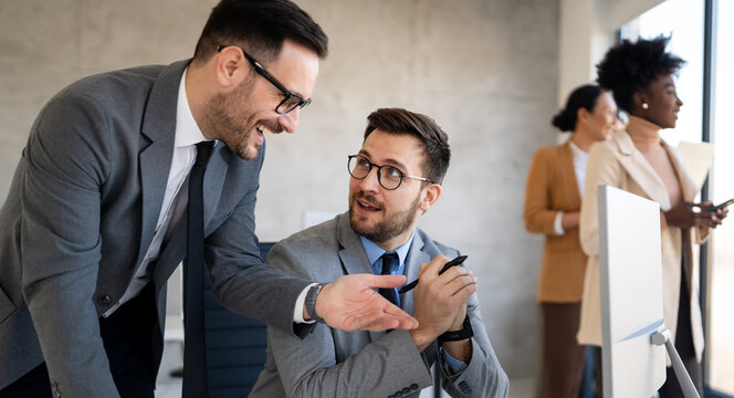 A modern business team uses technology, digital workflow, online tools, and workplace innovation