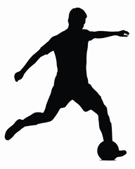 Obraz premium Silhouette of a soccer player kicking a ball