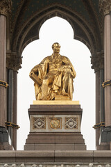 Obraz premium Prince Albert Memorial gilded statue beneath Gothic canopy in Kensington Gardens, London, UK