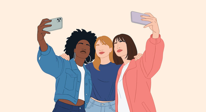 Group of three diverse young women smiling happily and taking a selfie together with their smartphones.
