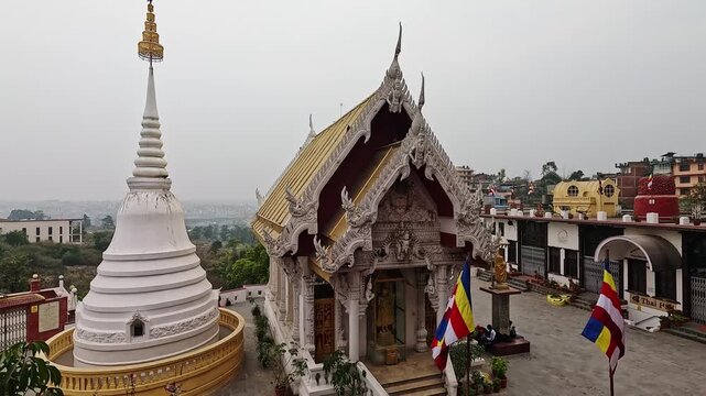 Nagar Mandap Shree Kirti Bihar Thai temple and stupa with Buddhist flags, Thai Hall sign visible, Kirtipur, Nepal