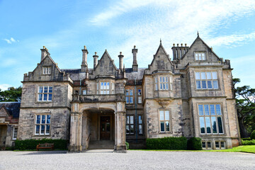 Fototapeta premium Muckross House is a historic mansion in Killarney National Park in Ireland. Today, the property serves as a museum and is one of the most famous sights in the region.