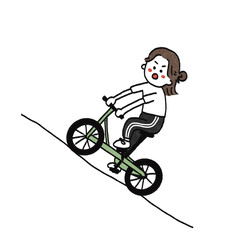 Fototapeta premium 坂道で自転車を漕ぐ女の子