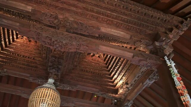Intricate Indonesian Wooden Carving Tumpang Sari Joglo Roof Close Up