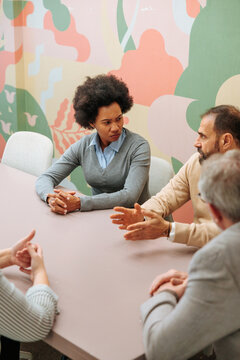 Diverse business professionals discussing during a team meeting