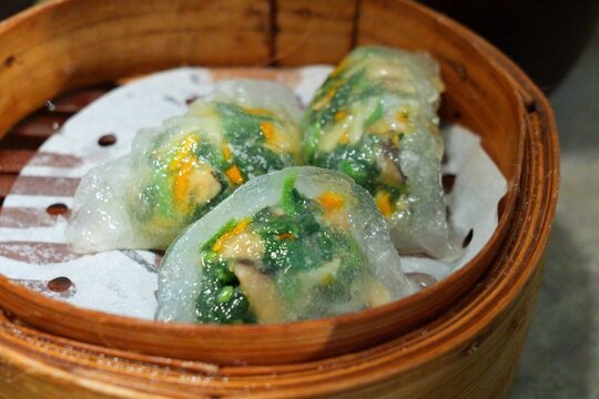 Dim sum dish - spinach and enoki mushroom teochew dumplings. Cantonese food in Hong Kong, China.