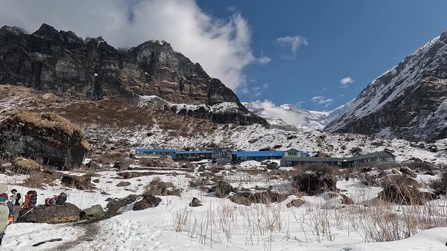 Slow pan across Machapuchare Base Camp and the Fishtail summit, Annapurna, Nepal