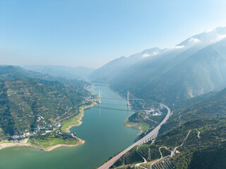 A high angle view of a suspension bridge crossing over the Three Gorges Reservoir in Yichang China...