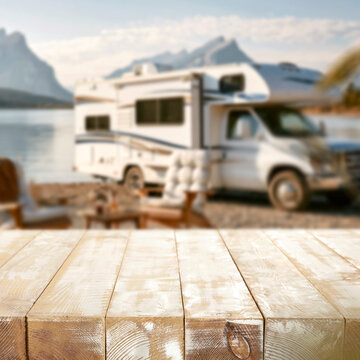 Beach camping scene on a sandy tropical shoreline under a bright blue sky. Copy space for product placement or advertising text with relaxing outdoor summer atmosphere.