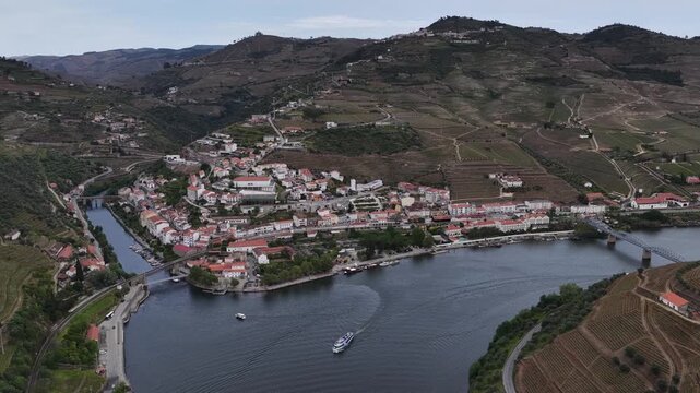 Aerial Drone View of Pinhao Village and Cruise Fleet on the Douro River Valley