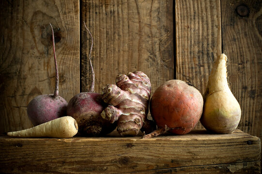 Winter vegetables on rustic wooden background