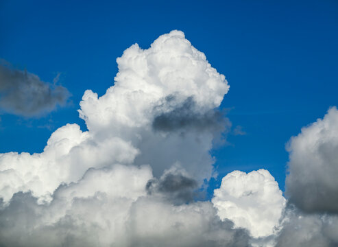 A fast growing cloud forms a thunderstorm in the sky