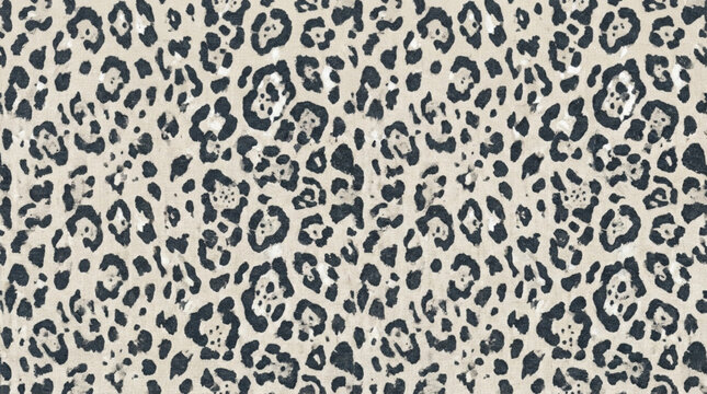 Close-up of leopard print pattern with black spots on light beige background for fashion design and animal themed visuals