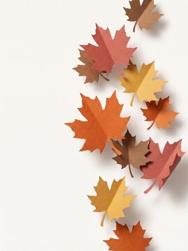 Colorful Paper Cut-out Maple Leaves on White Background