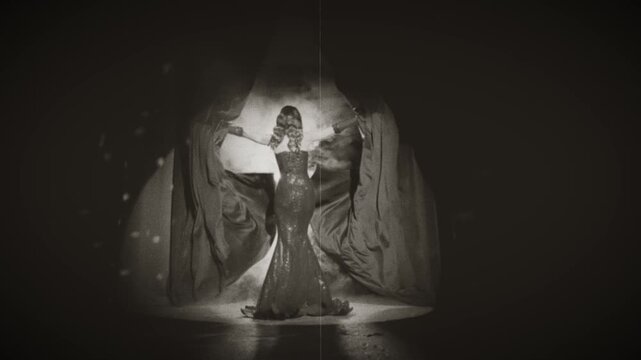 black and white color film sexy woman opens curtains throws drapes goes on stage full smoke singer fashion model, long dress. girl beauty girl goddess. Retro lady old style hair 20s new year party.