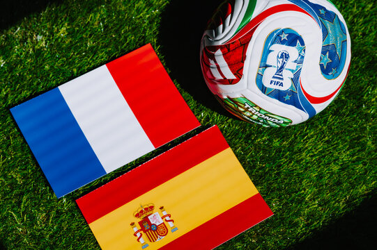 FIFA World Cup 2026 semifinal: France vs Spain, national flags representing both teams ahead of the international football tournament. Editorial illustration