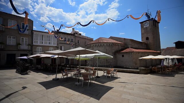 Shaded Granite Alleyway in the Medieval Historic Quarter of Allariz Spain During a Summer Heatwave