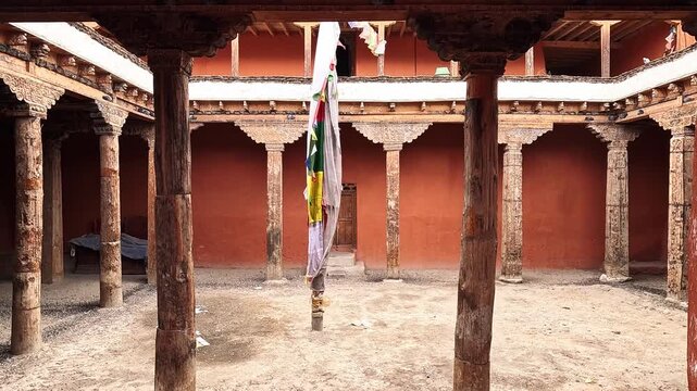 Jampa Lhakhang Monastery courtyard carved wooden pillars Lo Manthang Upper Mustang Nepal