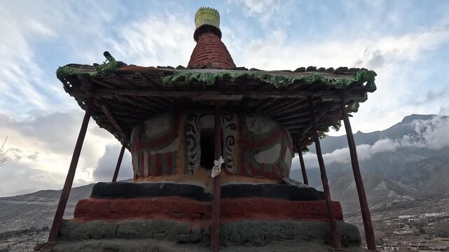 Decorated Buddhist chorten ornate spire peaks mountains Ghiling Upper Mustang Nepal