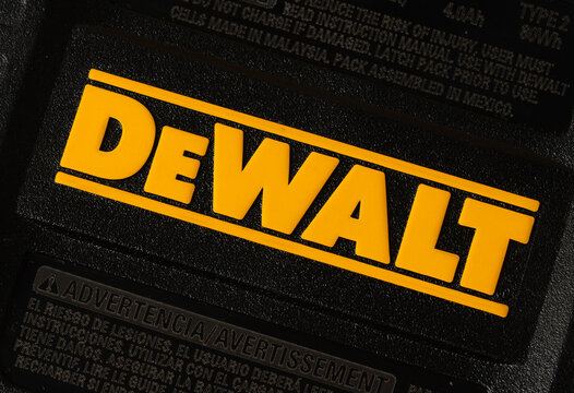 Kharkiv, Ukraine, July 13 2026: Illustrative Editorial of DeWalt Brand Logo Close-Up on Black Battery Pack Surface.