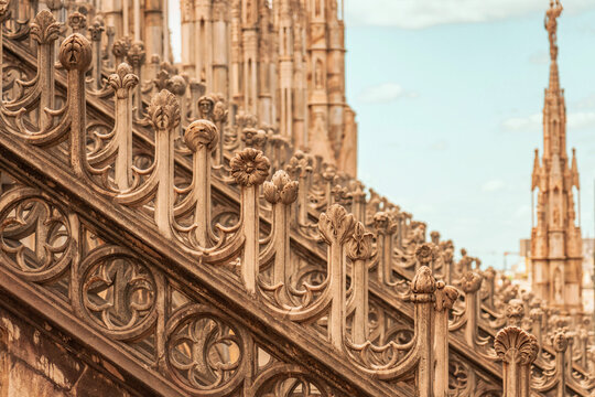 Close up detail of gothic marble railing carvings on Milan Cathedral.