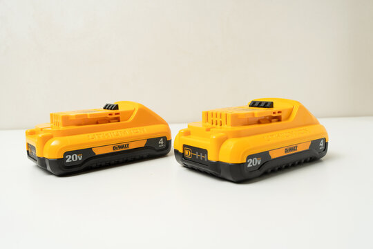 Kharkiv, Ukraine, July 12 2026: Illustrative Editorial of  Two DeWalt 20V MAX Lithium-Ion Battery Packs on White Background.