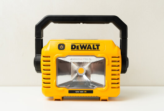 Kharkiv, Ukraine, July 12 2026: Illustrative editorial of DeWalt DCL077 Cordless LED Work Light Front View on White Background.
