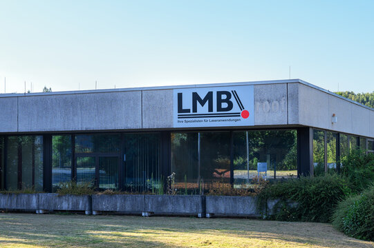Iserlohn, Germany - July 09, 2026: Modern building displaying the LMB Ihre Spezialisten fuer Laseranwendungen company sign