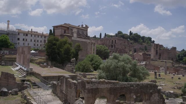Roman Forum Ruins and Victor Emmanuel II Monument Under Bright Summer Sky in Rome Italy Historic Landmark Travel View Shot with Cinema Camera