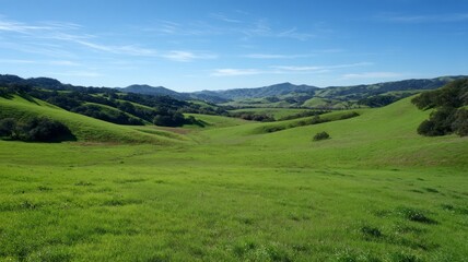 Obraz premium Rolling hills with blue sky and mountains. Artificial intelligence image