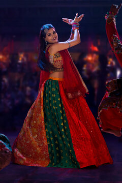Gujrati woman performing Garba on stage