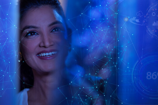Businesswoman Smiling with icons on virtual screen