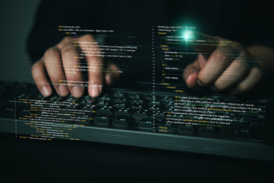 programmer hands typing computer keyboard pointing glowing code hologram virtual screen software development web programming cybersecurity digital technology hacker coding script HTML CSS network