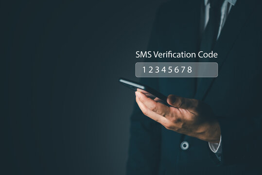 businessman holding smartphone receiving sms verification code otp one time password two factor authentication mobile security cybersecurity online banking safe login protection interface system