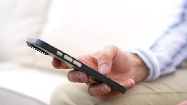 Close up of hands using smartphone for business communication, AI assistant, mobile workflow, digital messaging, online collaboration, remote productivity, cloud services and modern technology.