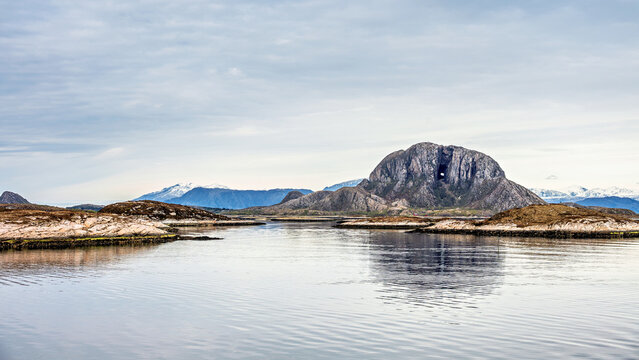 Torghatten is a granite dome on the island of Torget in Br?Bronnoy ?y Municipality in Nordland county, Norway.