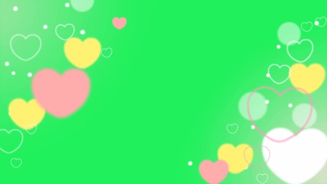 Animation pink heart shape frame on green background.