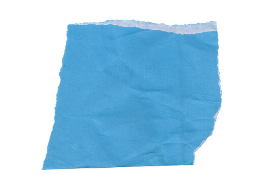 Blue folded paper corner on flat surface isolated on white background