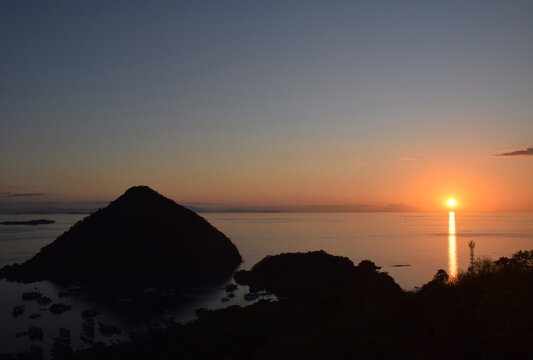 The natural beauty of sunset from Sylvia Hill, Labuan Bajo, East Nusa Tenggara, Indonesia, beautiful view, sunset from the edge of the sea