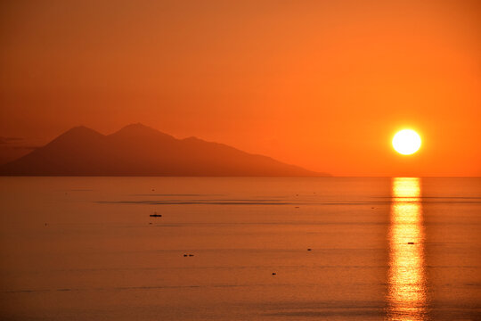 The natural beauty of sunset from Sylvia Hill, Labuan Bajo, East Nusa Tenggara, Indonesia, beautiful view, sunset from the edge of the sea