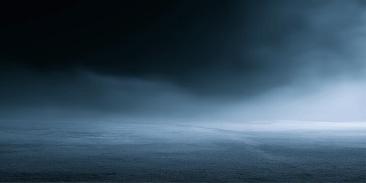 Dramatic Dark Storm Clouds Over the Sea River and Horizon Under Moonlight with Blue Night Sky and Atmospheric Ocean Cloudscape Background