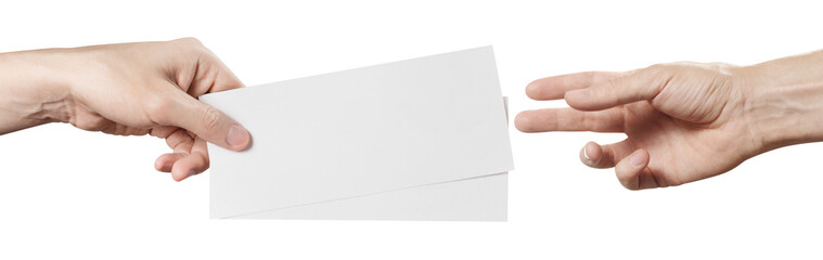 Fototapeta premium Two hands exchanging blank paper flyers or tickets, isolated on transparent cutout background