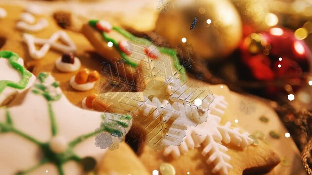 Camera shifting left starting snowflake overlay, iced cookies moving into closeup, showing detail