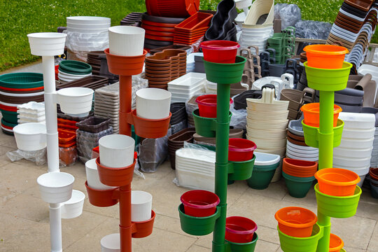 Vertical colourful plastic plant stands and pots for gardening