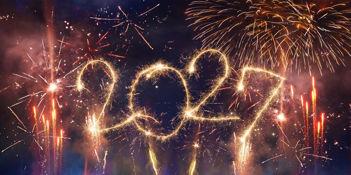 happy new year, new year's eve, silvester, new years eve, sparklers celebration greeting card, new year card - Year 2027 in sparkler font and firework fireworks pyrotechnic, blue night sky background