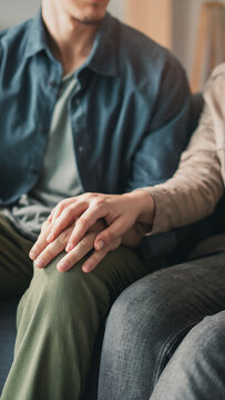 Young couple holding hands and supporting each other