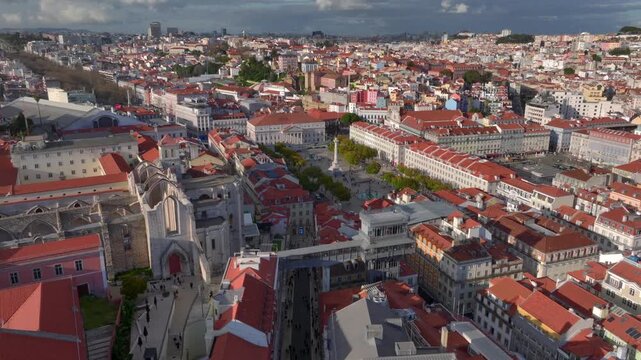 Santa Justa Elevator and Praca Dom Pedro IV Aerial view of Lisbon historic center on sunny day, Portugal.