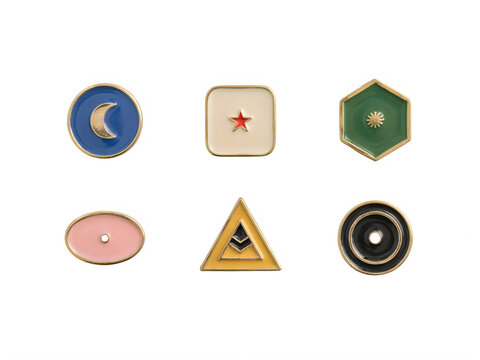 Colorful collection of geometric shaped buttons and pins