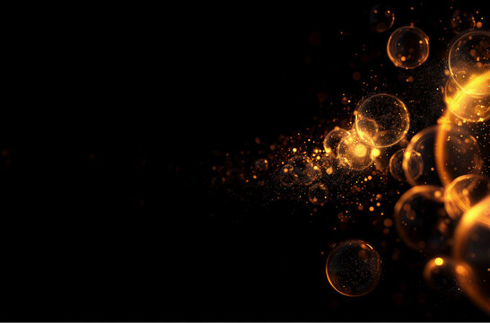 Luminous gold magic sphere drops on black background, abstract glowing particle bokeh for elegant fantasy graphic resource