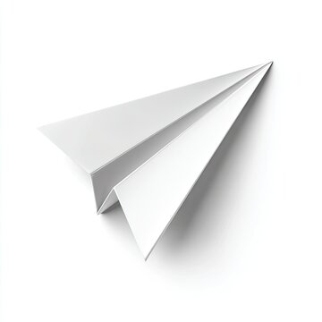 A crisp white paper airplane is suspended in the air, casting a soft shadow